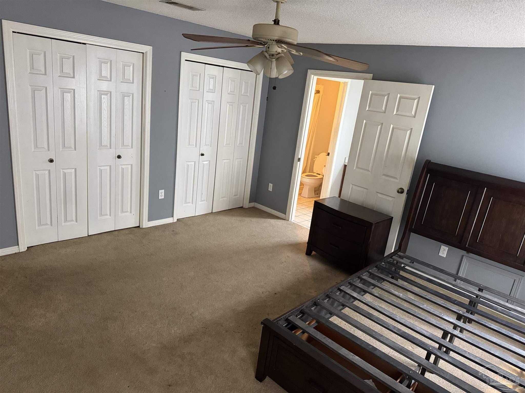 7551 McElhaney Road Century, FL 32535 - Photo 20 of 43 a view of an empty room with wooden floor and windows