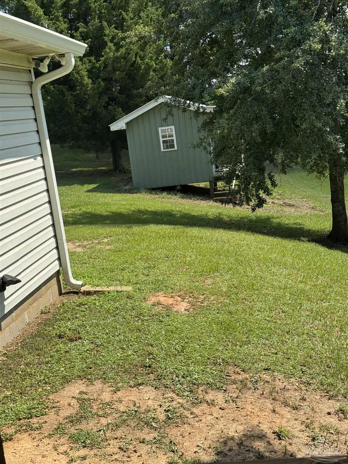 7551 McElhaney Road Century, FL 32535 - Photo 34 of 43 a view of a back yard