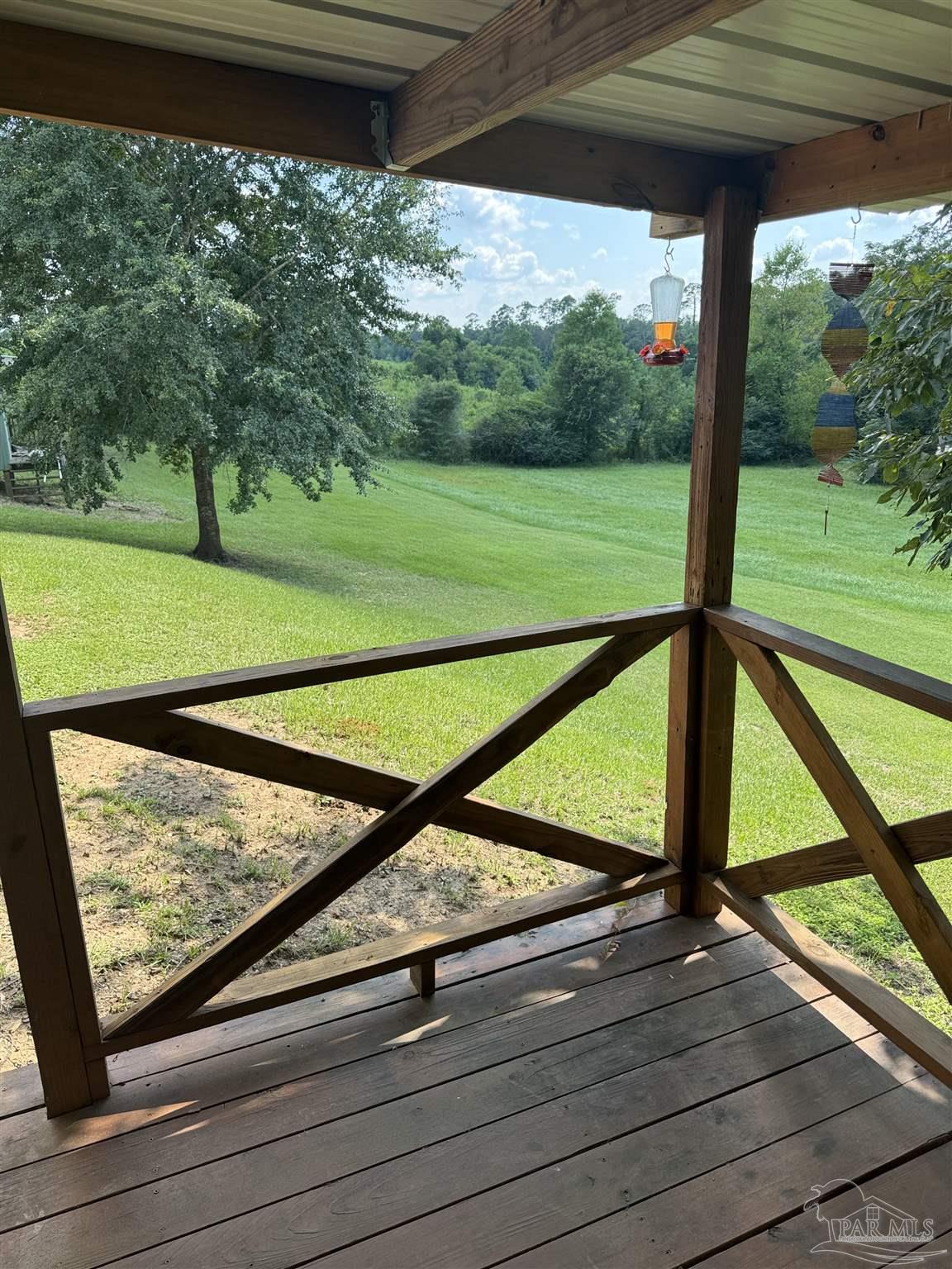 7551 McElhaney Road Century, FL 32535 - Photo 35 of 43 a view of a street from a balcony