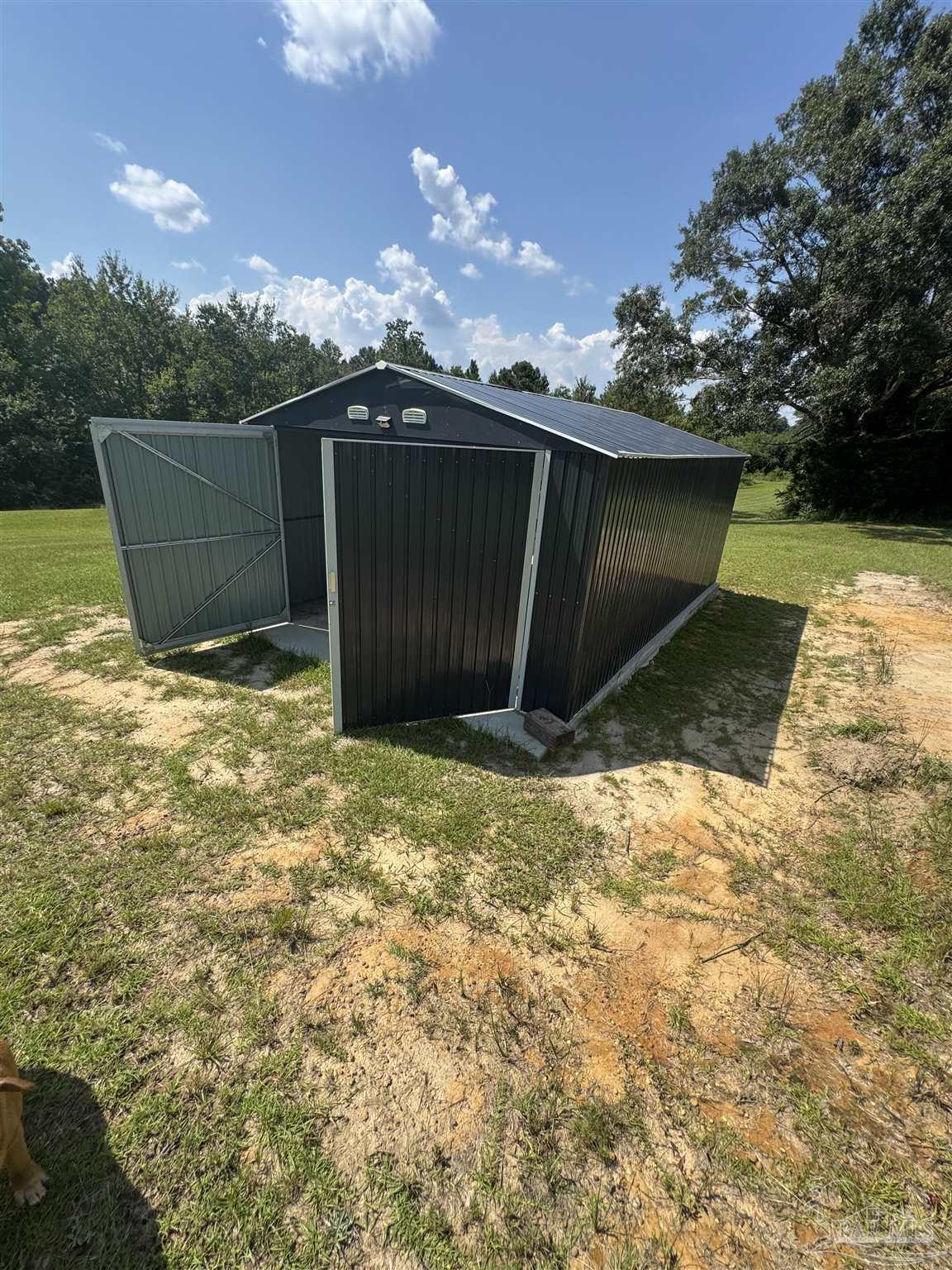 7551 McElhaney Road Century, FL 32535 - Photo 40 of 43 a view of a backyard of the house