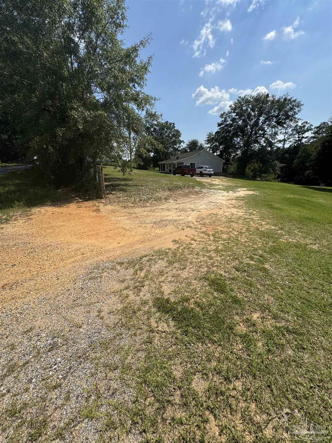 7551 McElhaney Road Century, FL 32535 - Photo 7 of 43 a view of a lake view