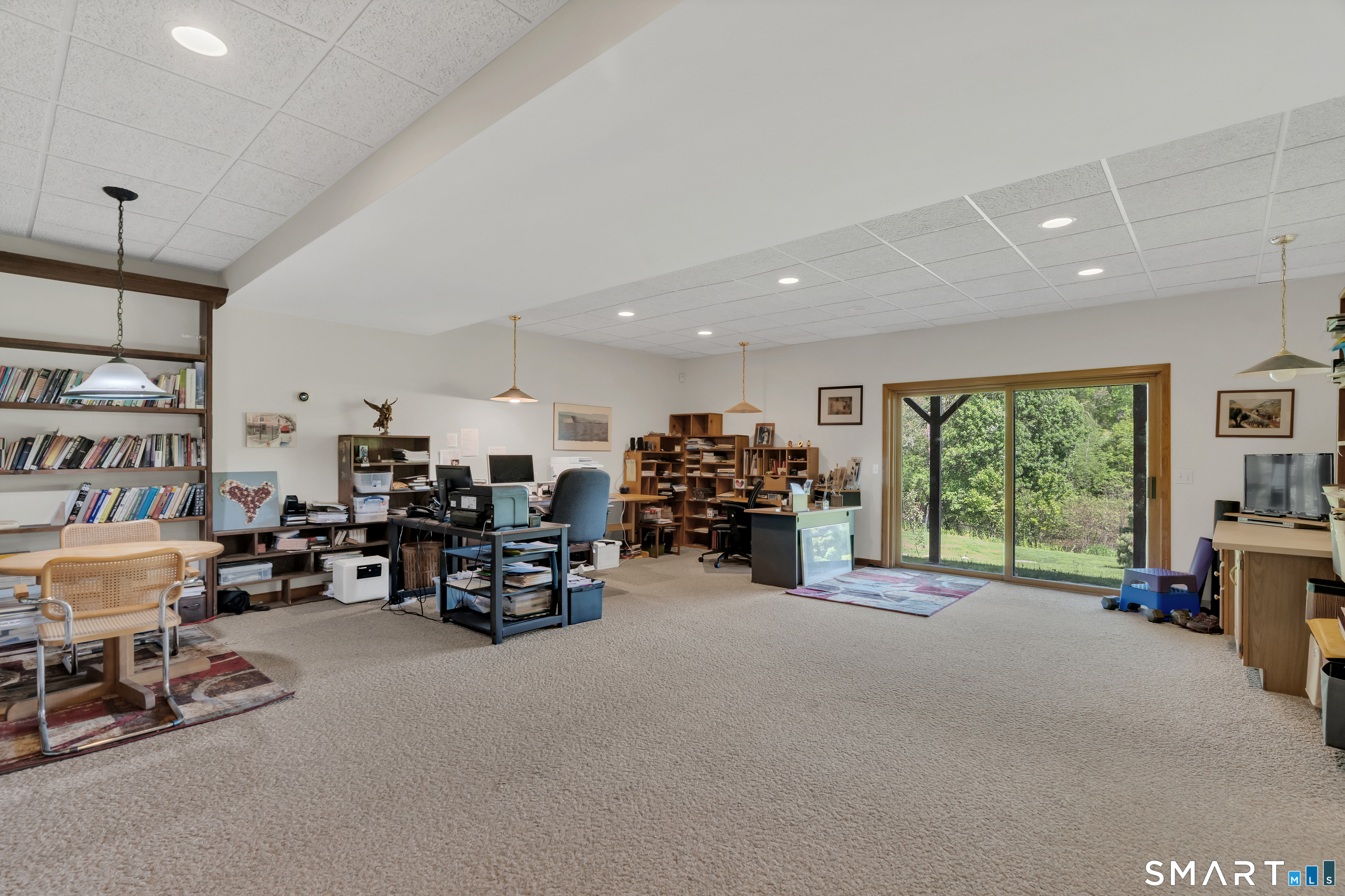 194 Quaker Farms Road Oxford, CT 06478 - Photo 30 of 40 a room with furniture and a large window