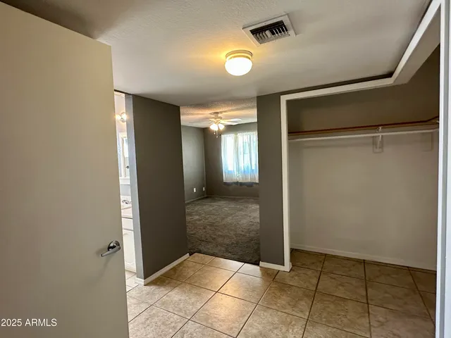 a bathroom with a sink a vanity and a toilet