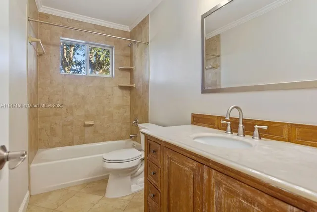 a bathroom with a sink a toilet and a bathtub