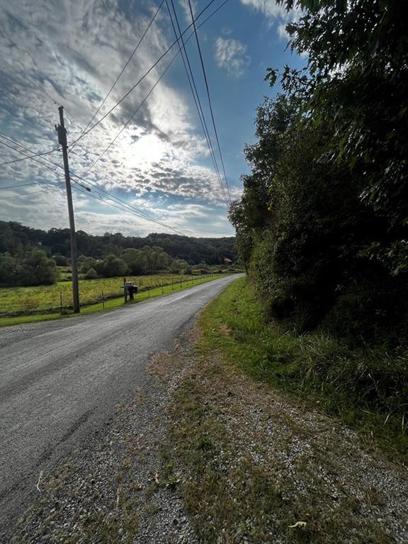 245 Schlemmer Road Rural Valley, PA 16249 - Photo 4 of 16 a view of a yard with wooden fence