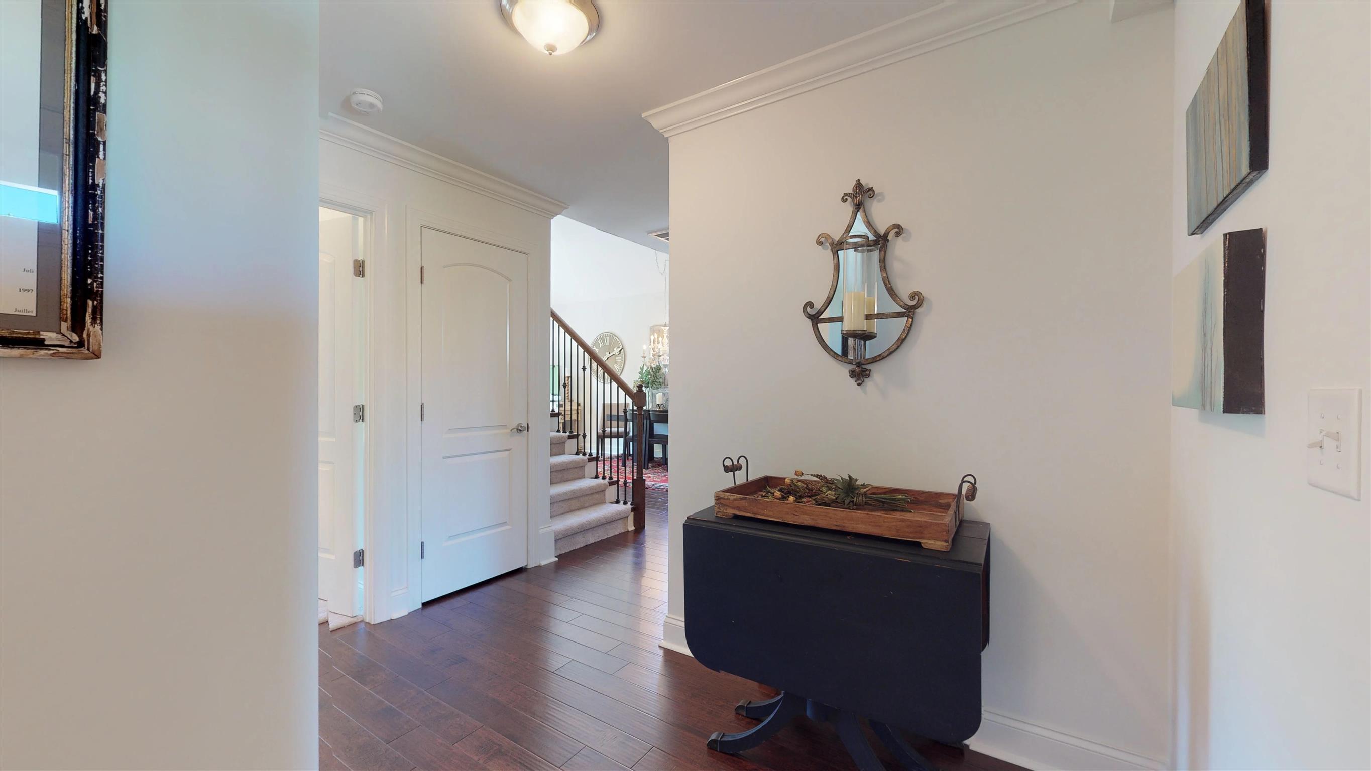 1065 Irish Way Spring Hill, TN 37174 - Photo 2 of 28 a view of workspace with wooden floor windows