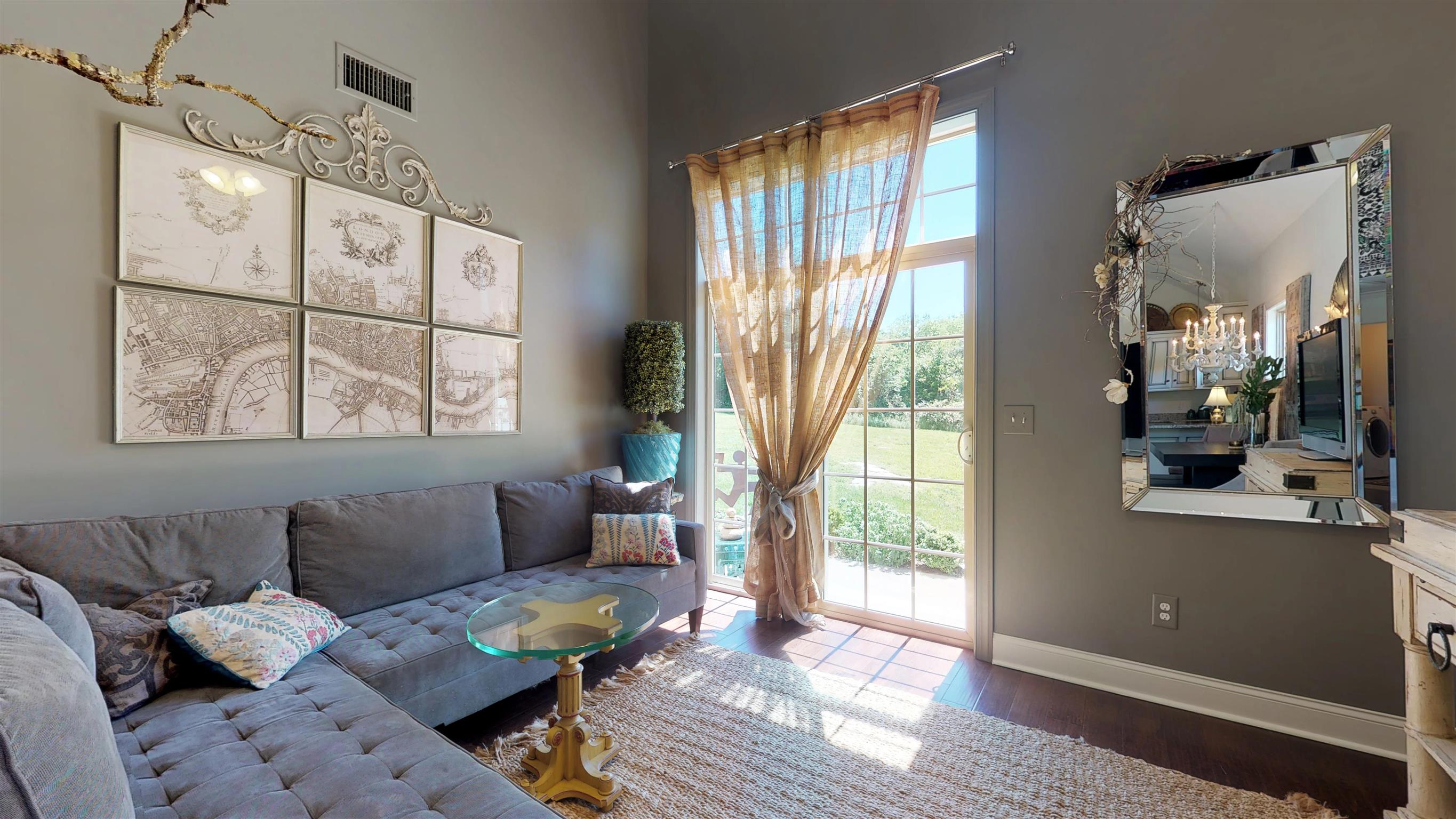 1065 Irish Way Spring Hill, TN 37174 - Photo 10 of 28 a living room with furniture and a window