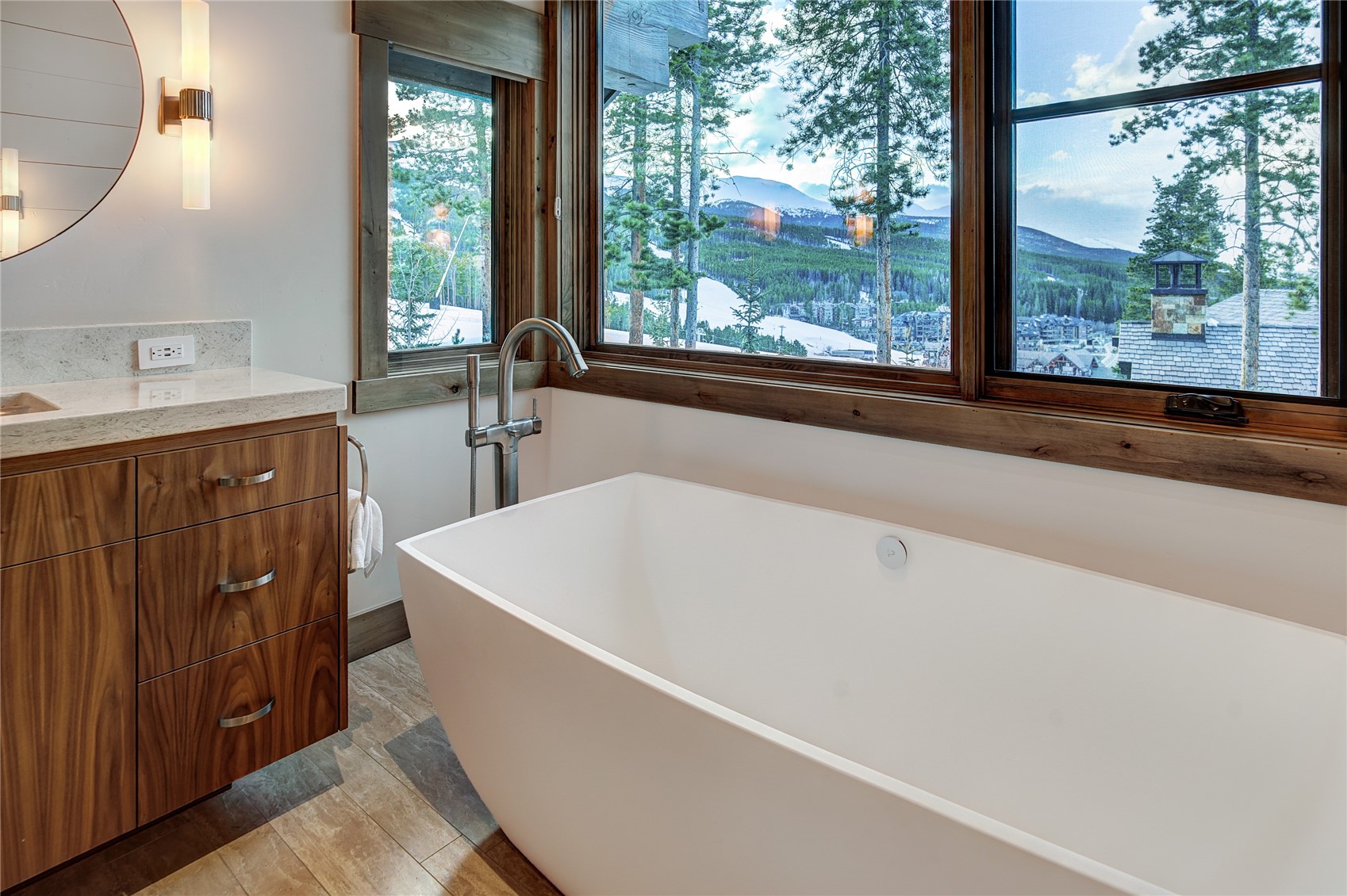 422 Timbertrail Road Breckenridge, CO 80424 - Photo 30 of 50 a white bath tub sitting in a bathroom