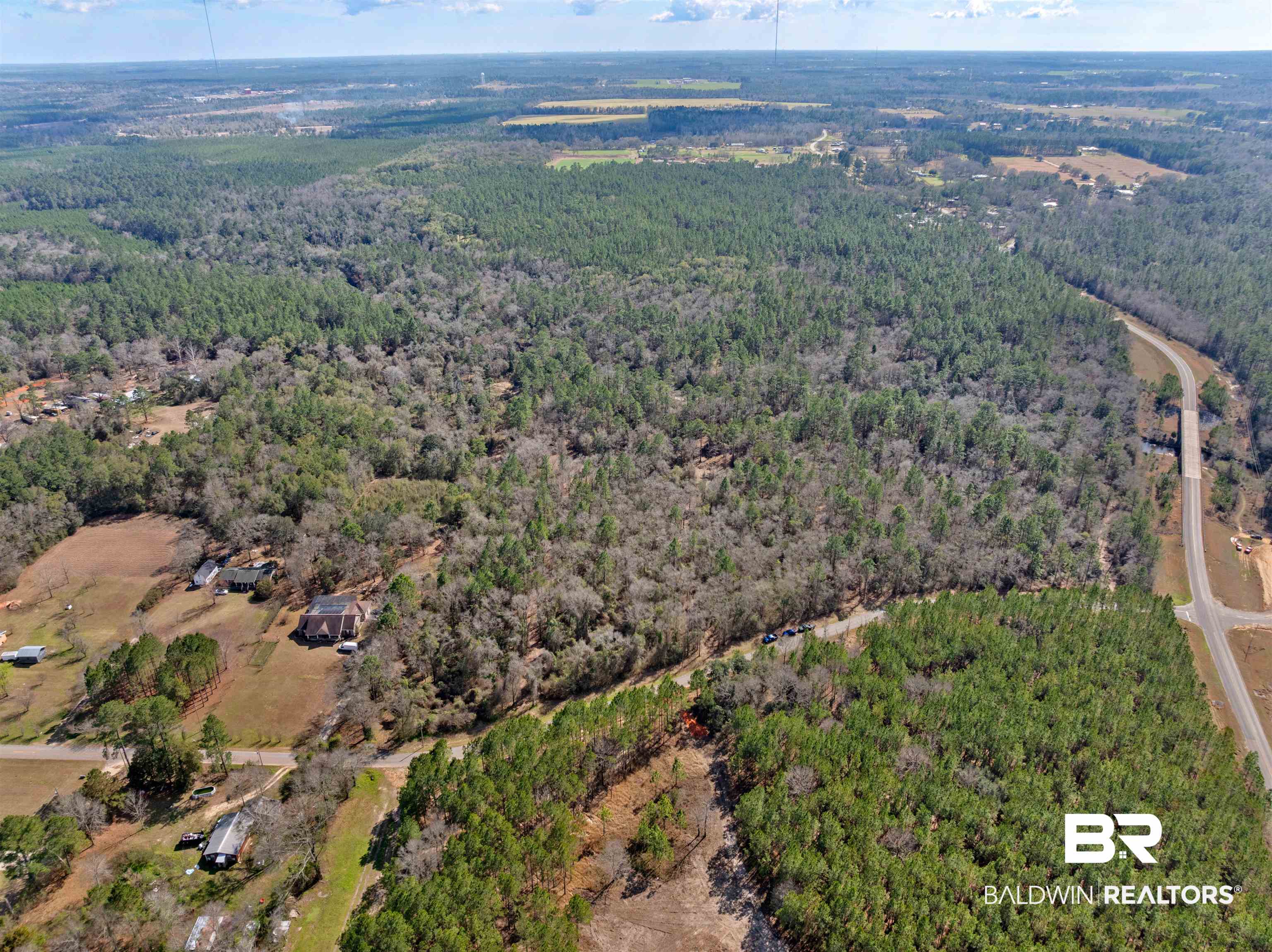 0 Dunbar Road Robertsdale, AL 36567 - Photo 23 of 36 Aerial overview of property's location featuring a heavily wooded area
