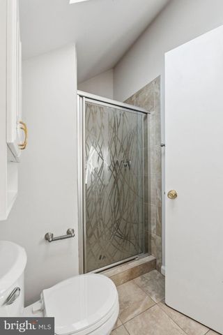a view of a balcony with wooden fence