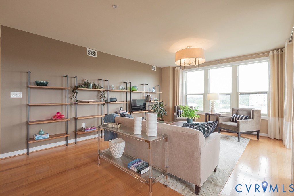 4820 Old Main Street, Unit 511 Henrico, VA 23231 - Photo 18 of 51 a living room with furniture and a large window