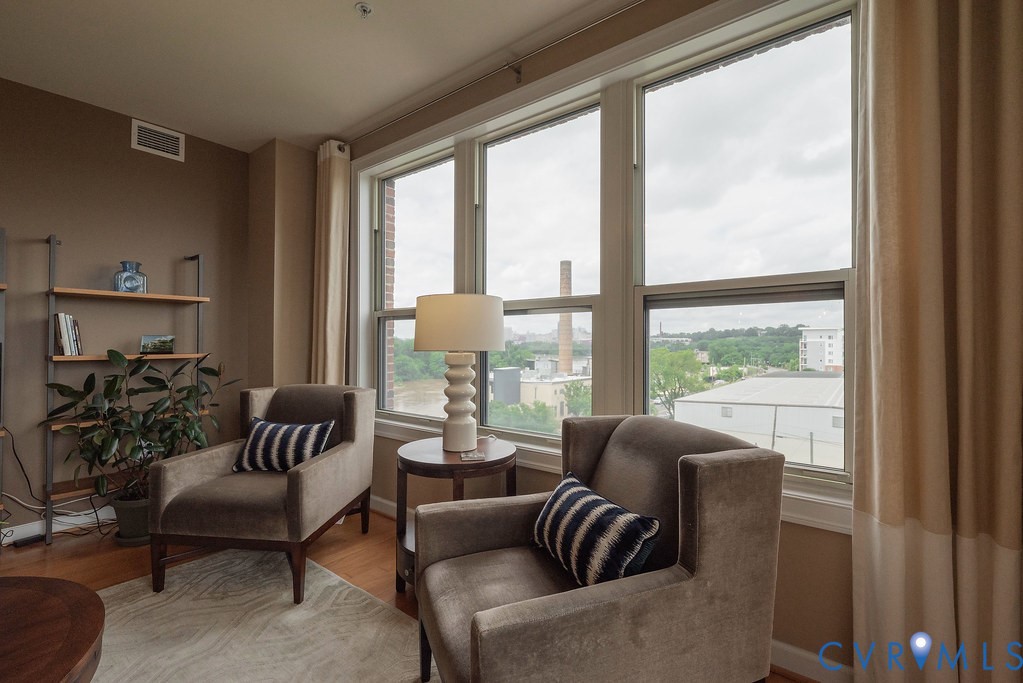 4820 Old Main Street, Unit 511 Henrico, VA 23231 - Photo 22 of 51 a living room with furniture and a large window