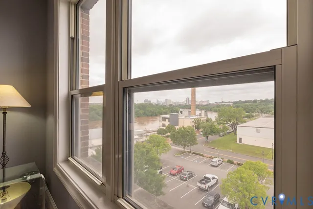 a view of a wooden floor and a window