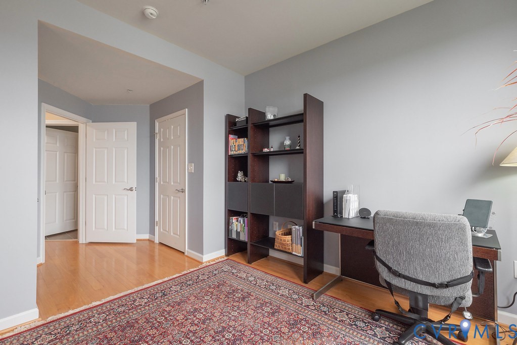 4820 Old Main Street, Unit 511 Henrico, VA 23231 - Photo 36 of 51 a living room with furniture and a dining table