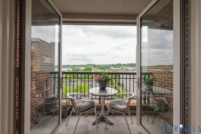 a view of a lake with a city skyline in the background