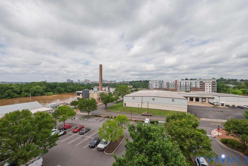 4820 Old Main Street, Unit 511 Henrico, VA 23231 - Photo 40 of 51 a view of a lake with a city skyline in the background