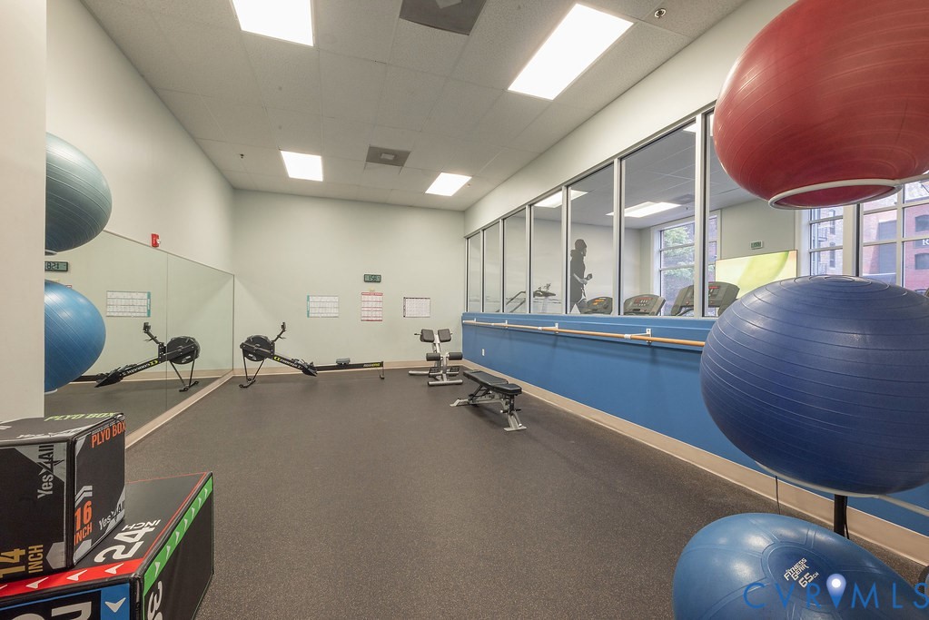 4820 Old Main Street, Unit 511 Henrico, VA 23231 - Photo 51 of 51 a room with gym equipment and a flat screen tv