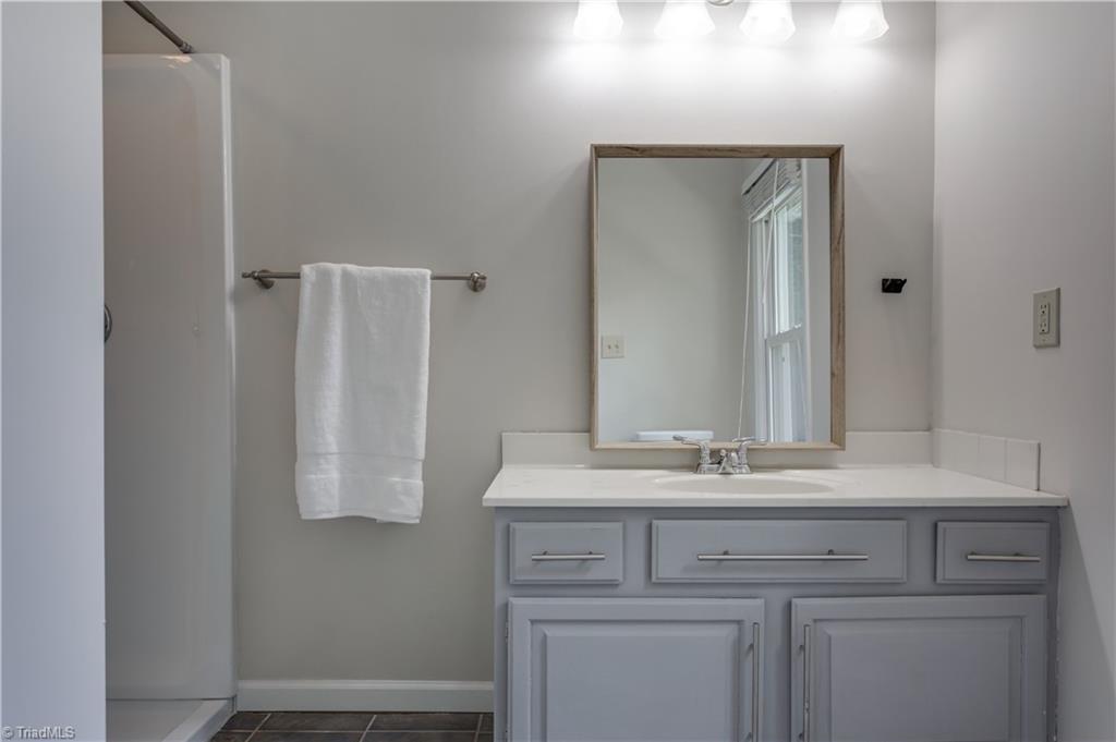 7004 Ridge Haven Road Greensboro, NC 27410 - Photo 21 of 29 Updated 2nd Floor Hall Bath with Double Sinks!