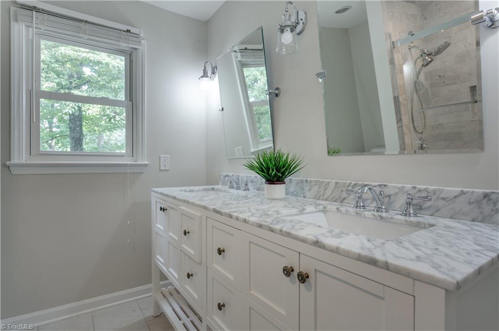 7004 Ridge Haven Road Greensboro, NC 27410 - Photo 22 of 29 Beautifully Updated 2nd Floor Hall Bath!