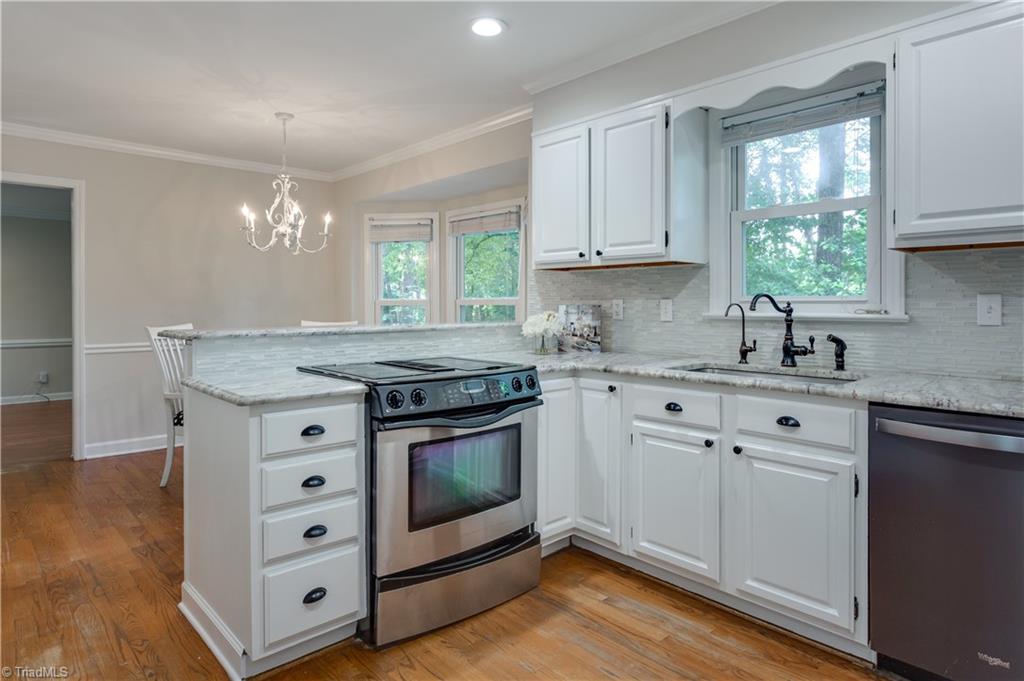 7004 Ridge Haven Road Greensboro, NC 27410 - Photo 9 of 29 Kitchen opens to Eat-In Area!