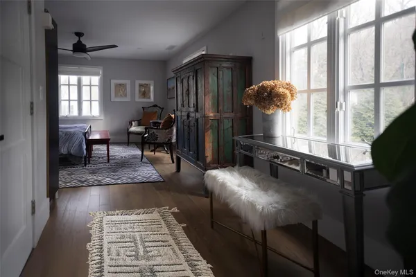 a living room with furniture and a window