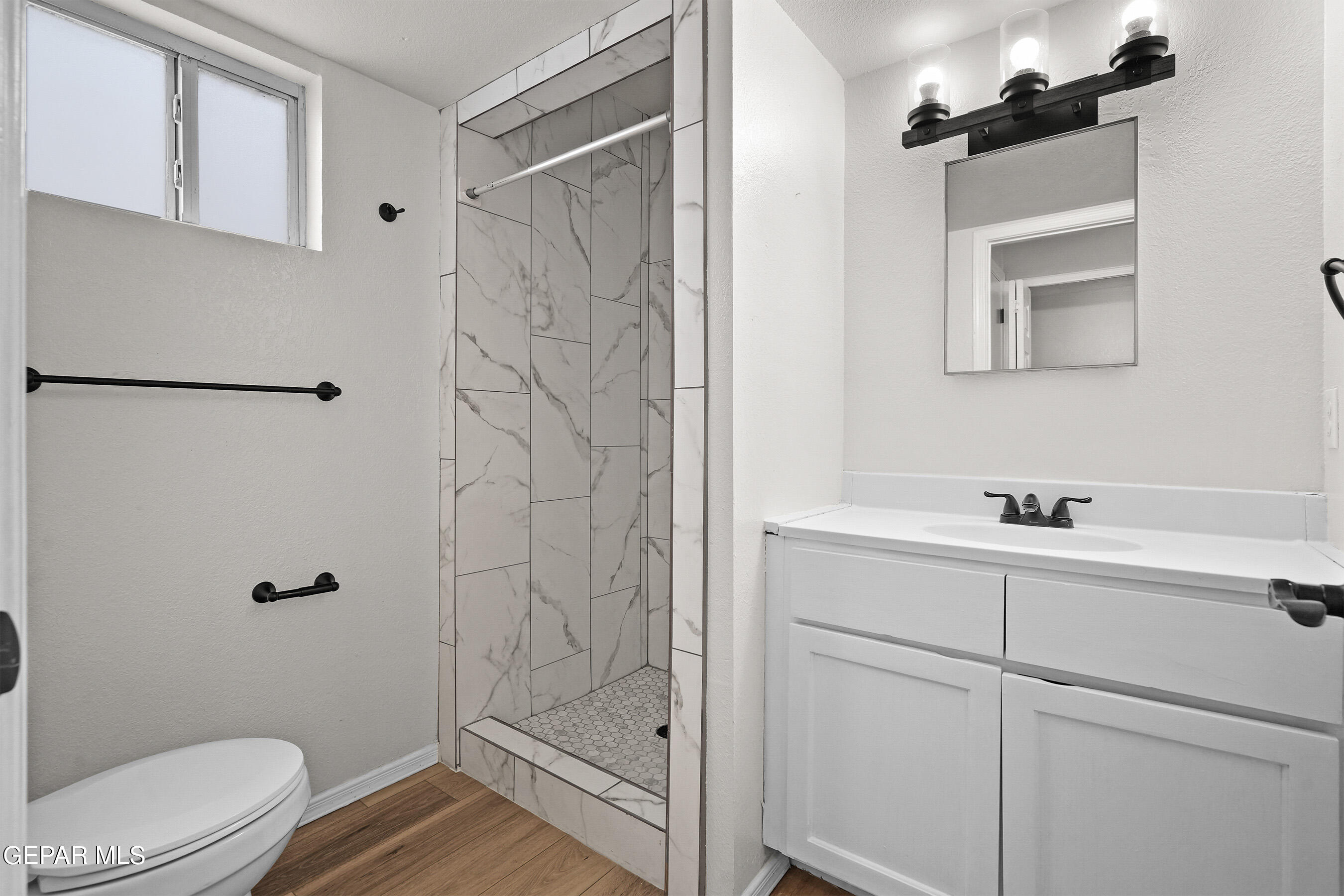 11023 Splendor Court El Paso, TX 79936 - Photo 17 of 43 Remodeled Bathroom