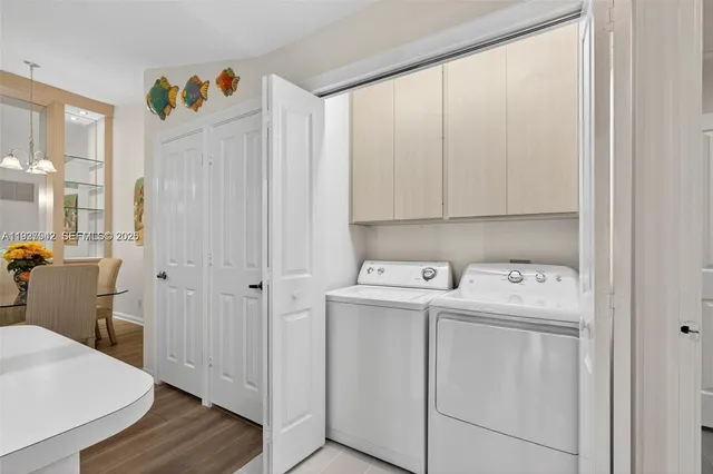 a kitchen with stainless steel appliances a refrigerator sink and cabinets