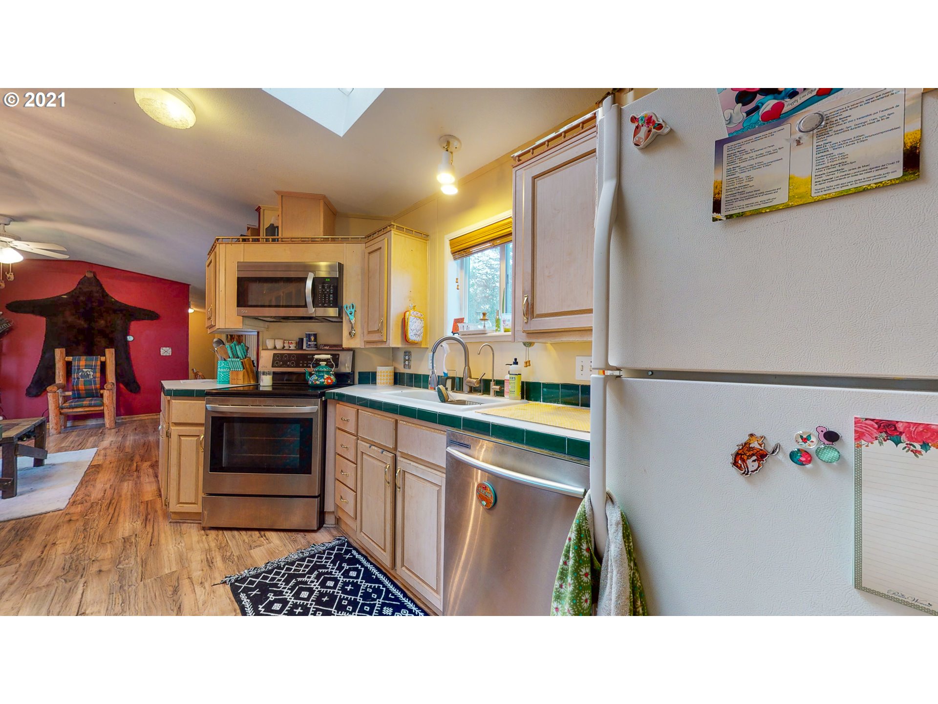 2230 North Ott Road Hermiston, OR 97838 - Photo 6 of 32 a kitchen with a sink and cabinets