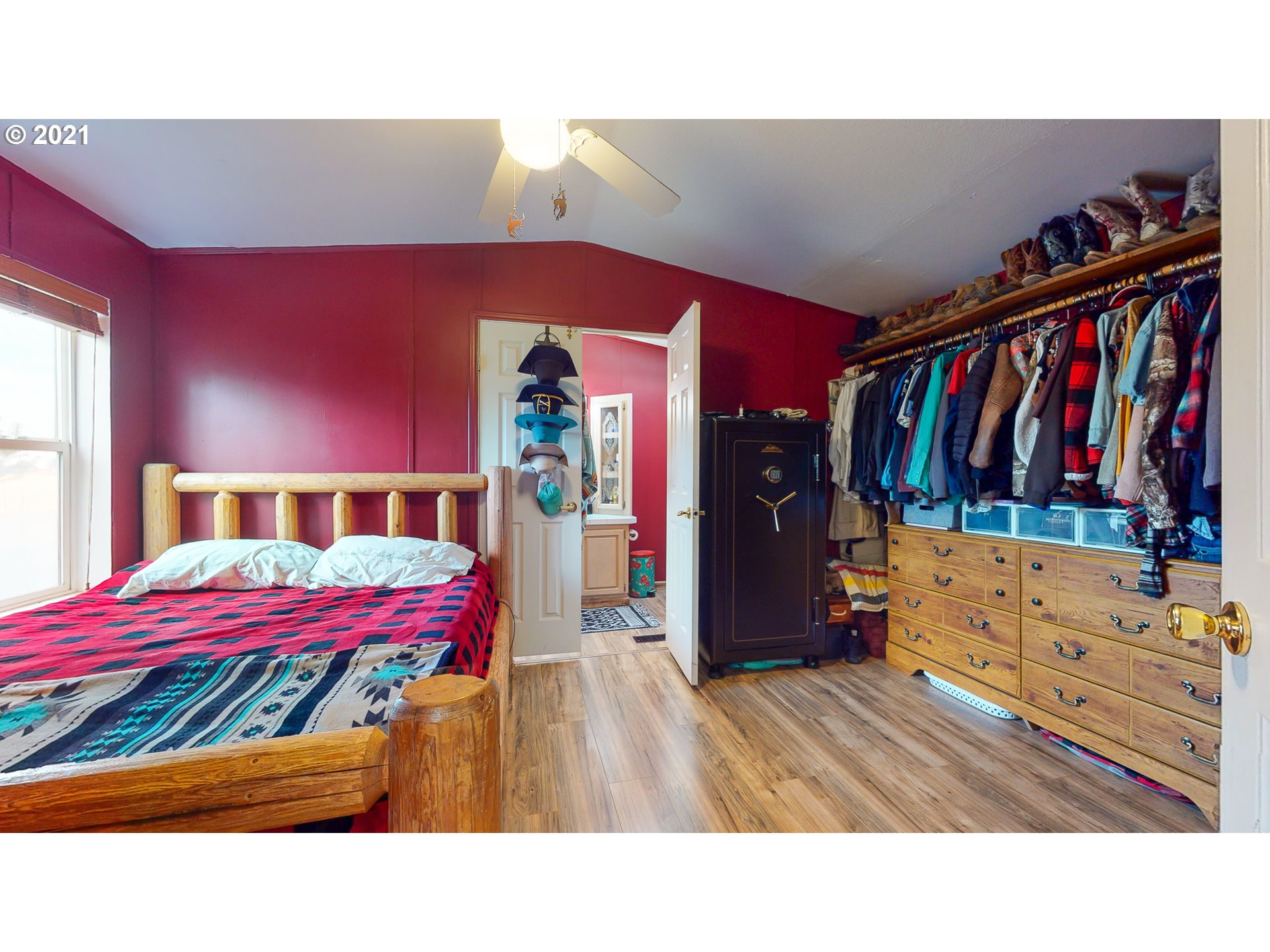 2230 North Ott Road Hermiston, OR 97838 - Photo 8 of 32 a bed room with a bed and a view of walk in closet