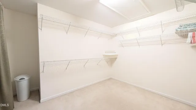 a view of a room with racks on the wall