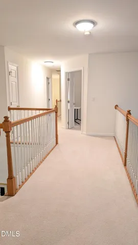 a view of a hallway with closet area