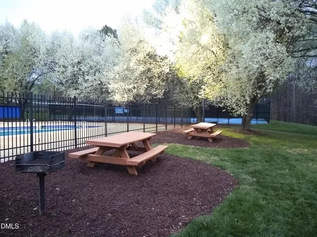 a garden view with a seating space