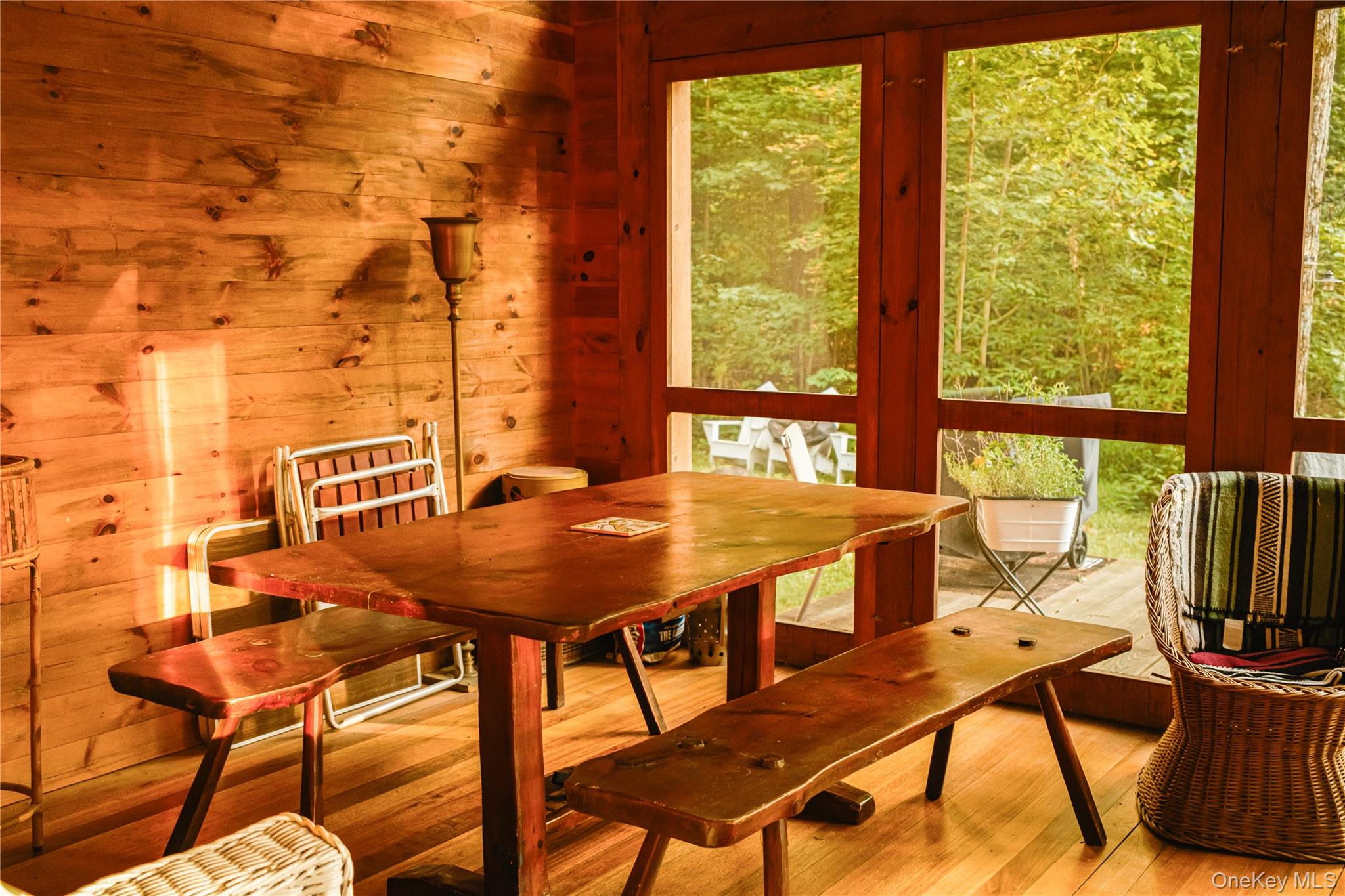 127 Queechy Shore Beach Road Canaan, NY 12029 - Photo 16 of 36 a view of a dining room with furniture and a window