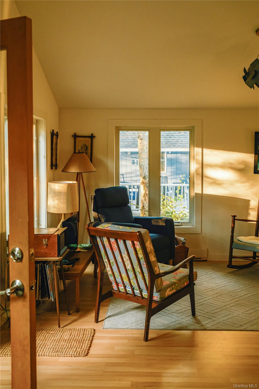 127 Queechy Shore Beach Road Canaan, NY 12029 - Photo 21 of 36 a living room with furniture a rug and a large window