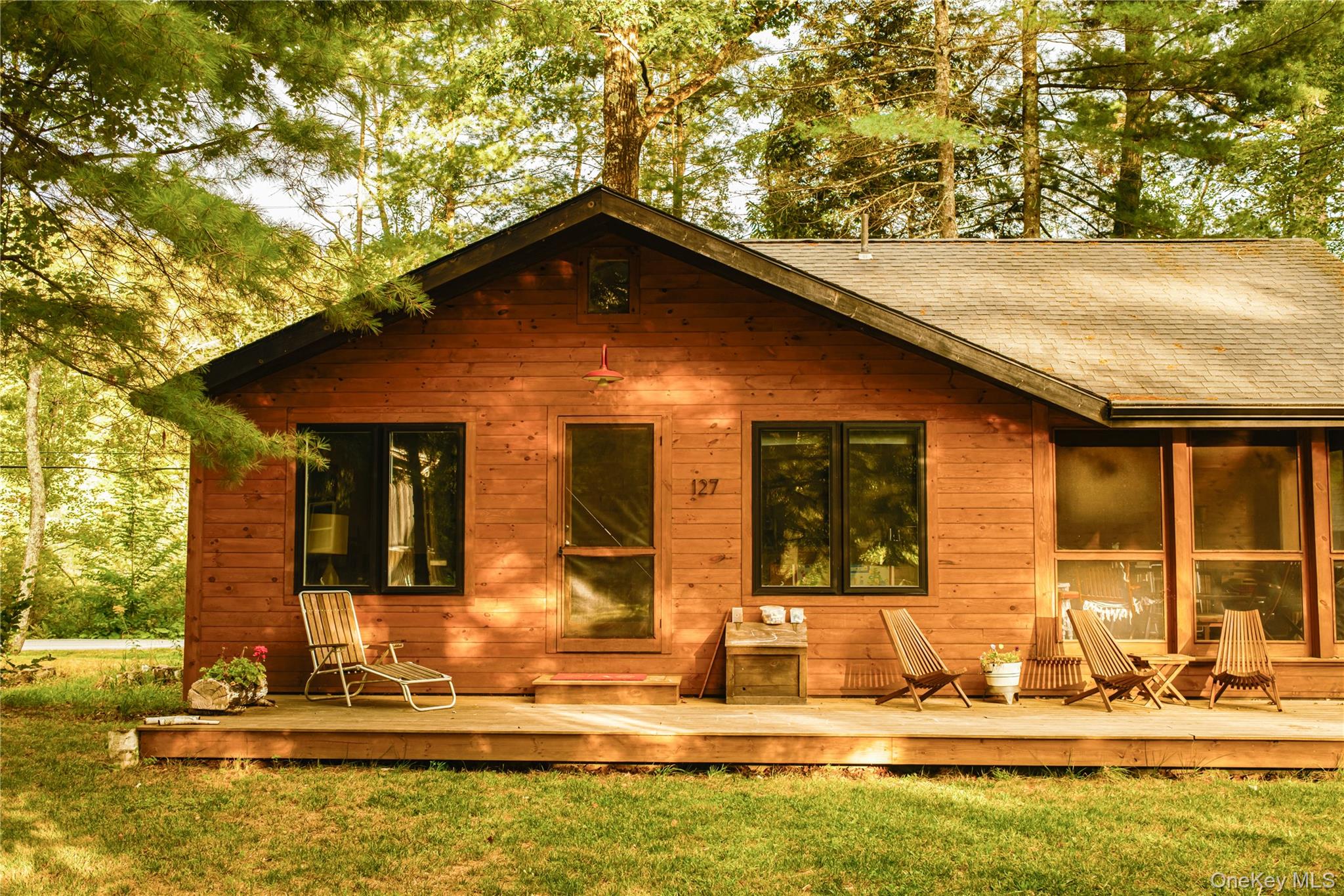 127 Queechy Shore Beach Road Canaan, NY 12029 - Photo 3 of 36 front view of a house with a yard