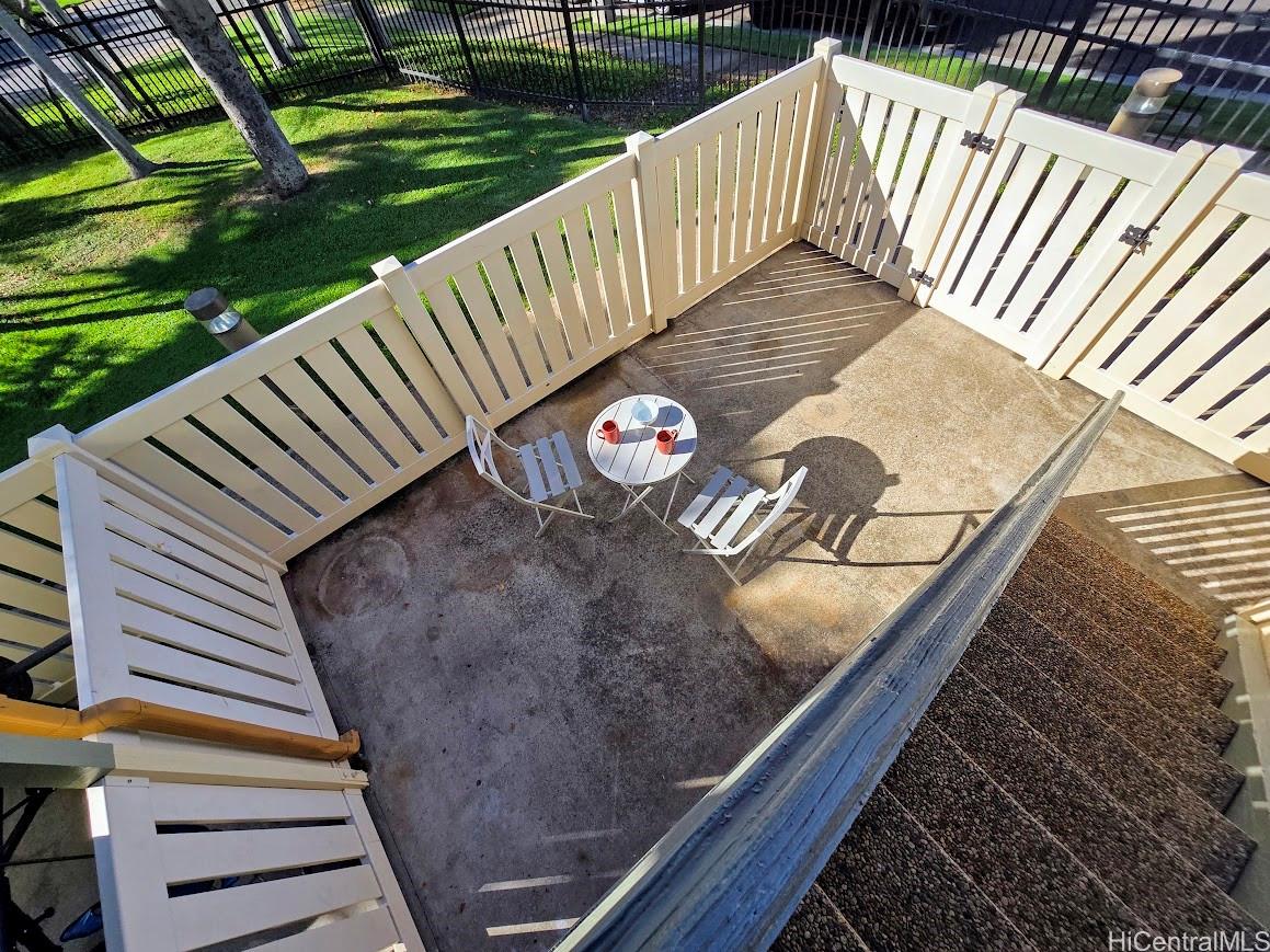 91-1109 Namahoe Street, Unit 1L Kapolei, HI 96707 - Photo 15 of 18 a balcony with view of swimming pool