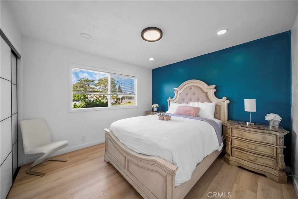 1158 North Ivescrest Avenue Covina, CA 91724 - Photo 16 of 27 a bedroom with a bed and a painting on the wall