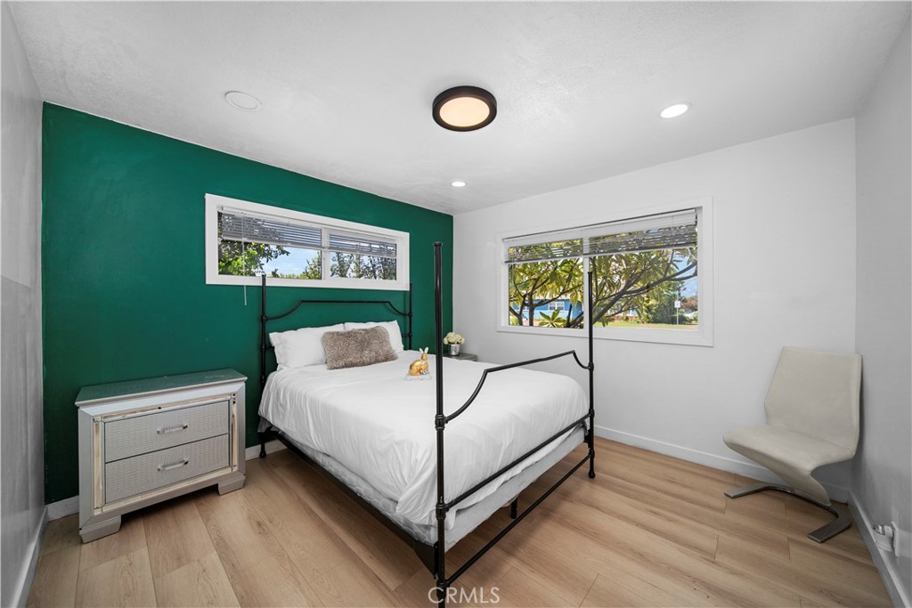 1158 North Ivescrest Avenue Covina, CA 91724 - Photo 17 of 27 a bedroom with a bed and a table