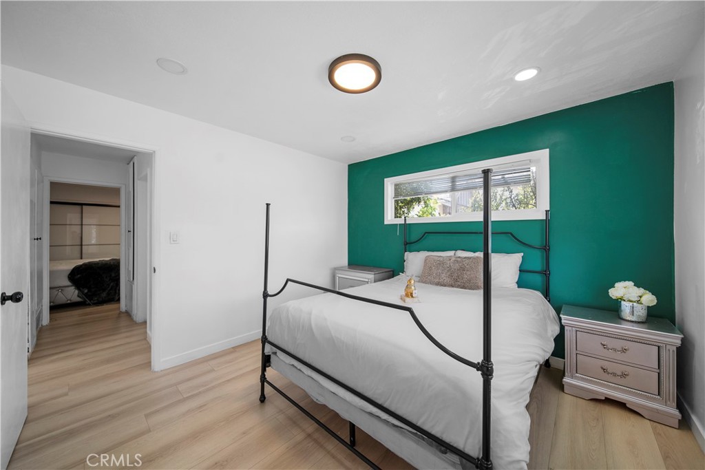 1158 North Ivescrest Avenue Covina, CA 91724 - Photo 18 of 27 a bedroom with a bed and a window
