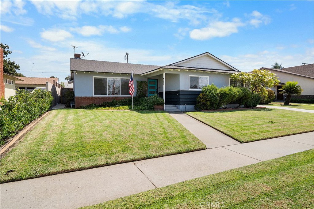 1158 North Ivescrest Avenue Covina, CA 91724 - Photo 2 of 27 a front view of a house with garden