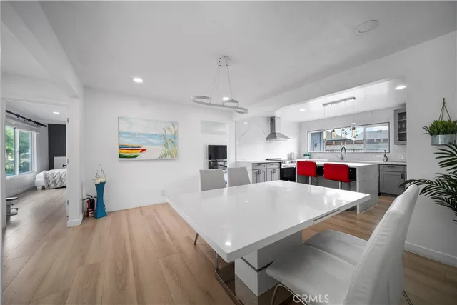 a view of kitchen dining room and wooden floor