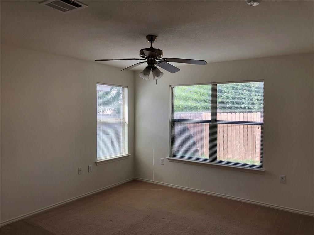 6912 Walkup Lane Austin, TX 78747 - Photo 10 of 14 a view of an empty room with a window