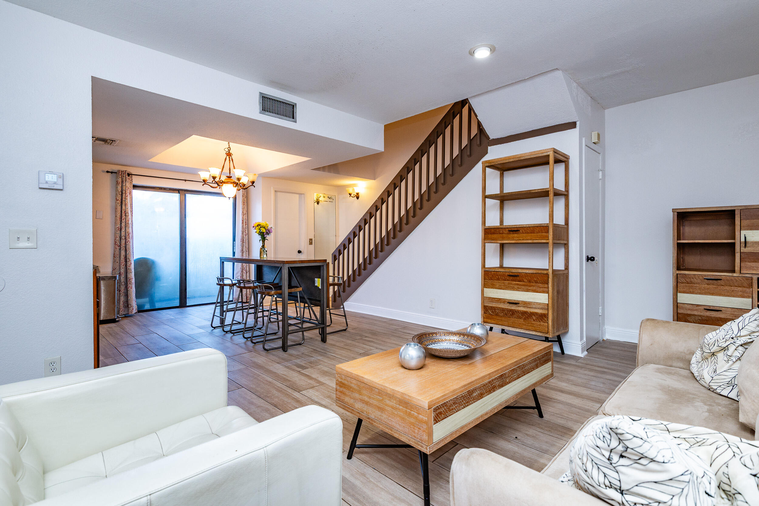 9375 Southwest 61st Way, Unit D Boca Raton, FL 33428 - Photo 11 of 30 a living room with furniture and wooden floor