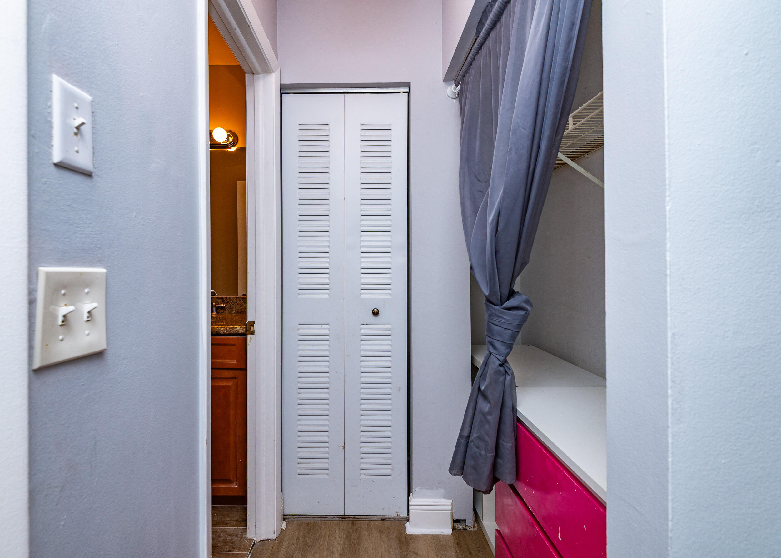 9375 Southwest 61st Way, Unit D Boca Raton, FL 33428 - Photo 16 of 30 a view of hallway with wooden floor