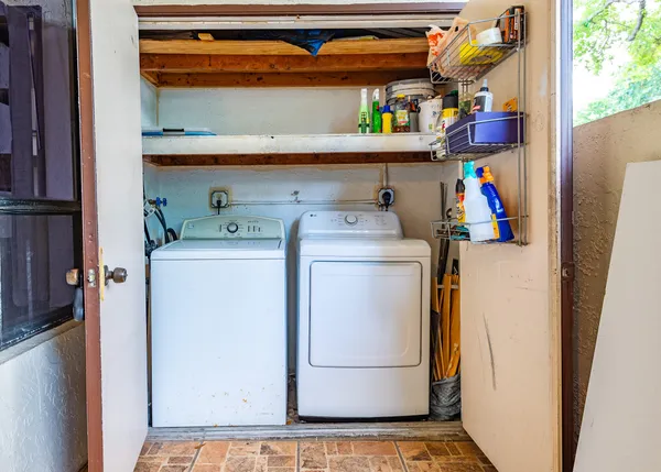 a utility room with dryer and washer