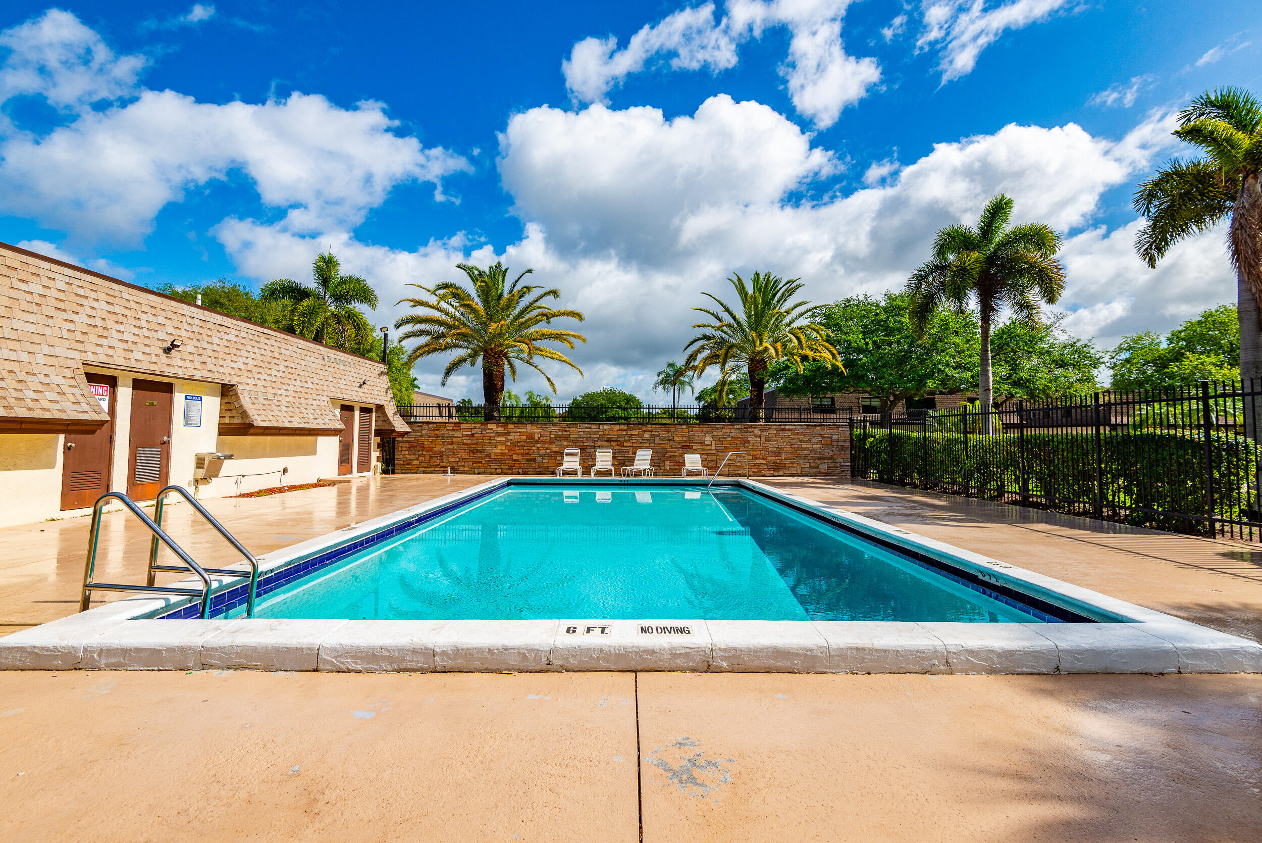 9375 Southwest 61st Way, Unit D Boca Raton, FL 33428 - Photo 30 of 30 a view of swimming pool with a yard