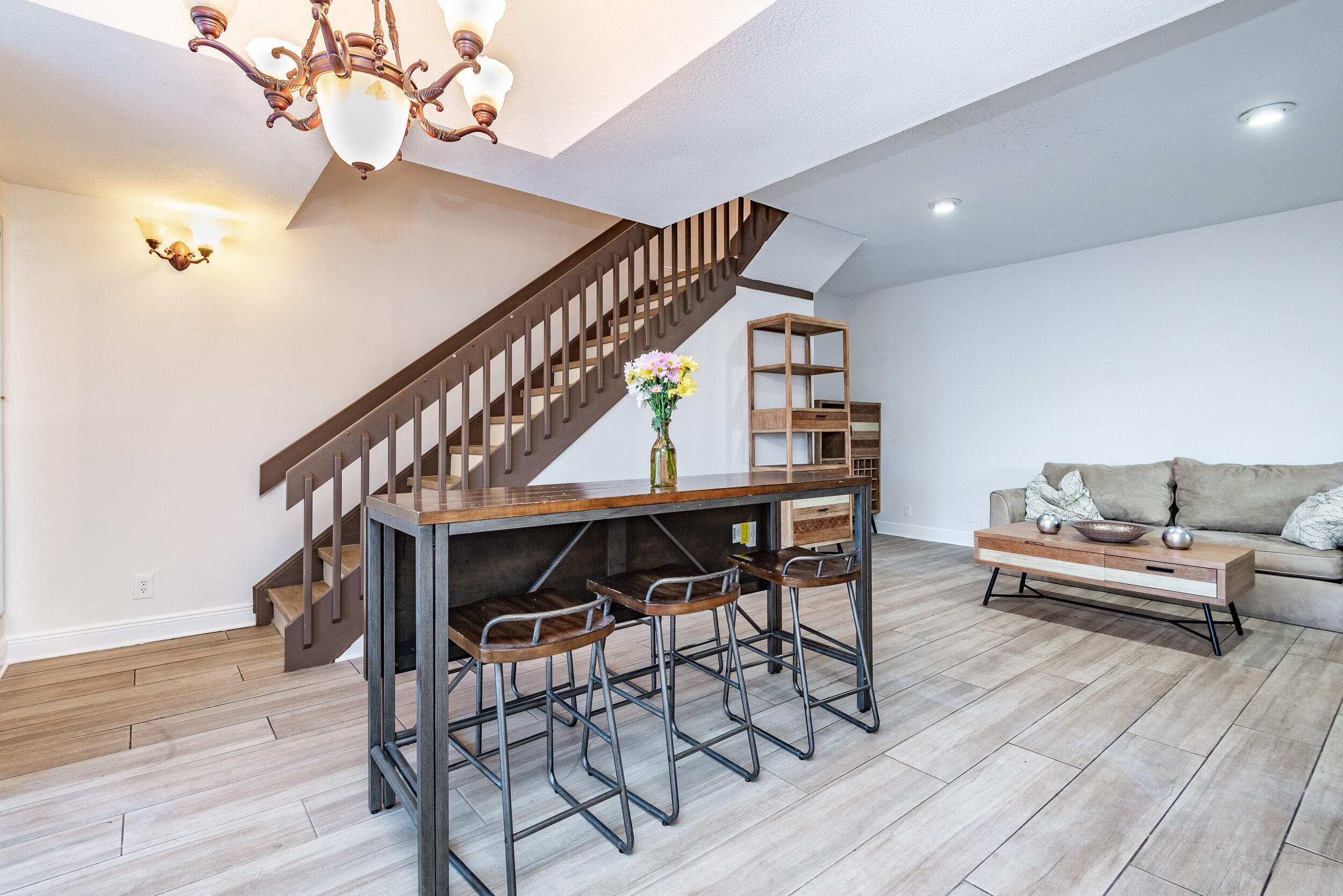 9375 Southwest 61st Way, Unit D Boca Raton, FL 33428 - Photo 7 of 30 a view of entryway livingroom and hall with wooden floor