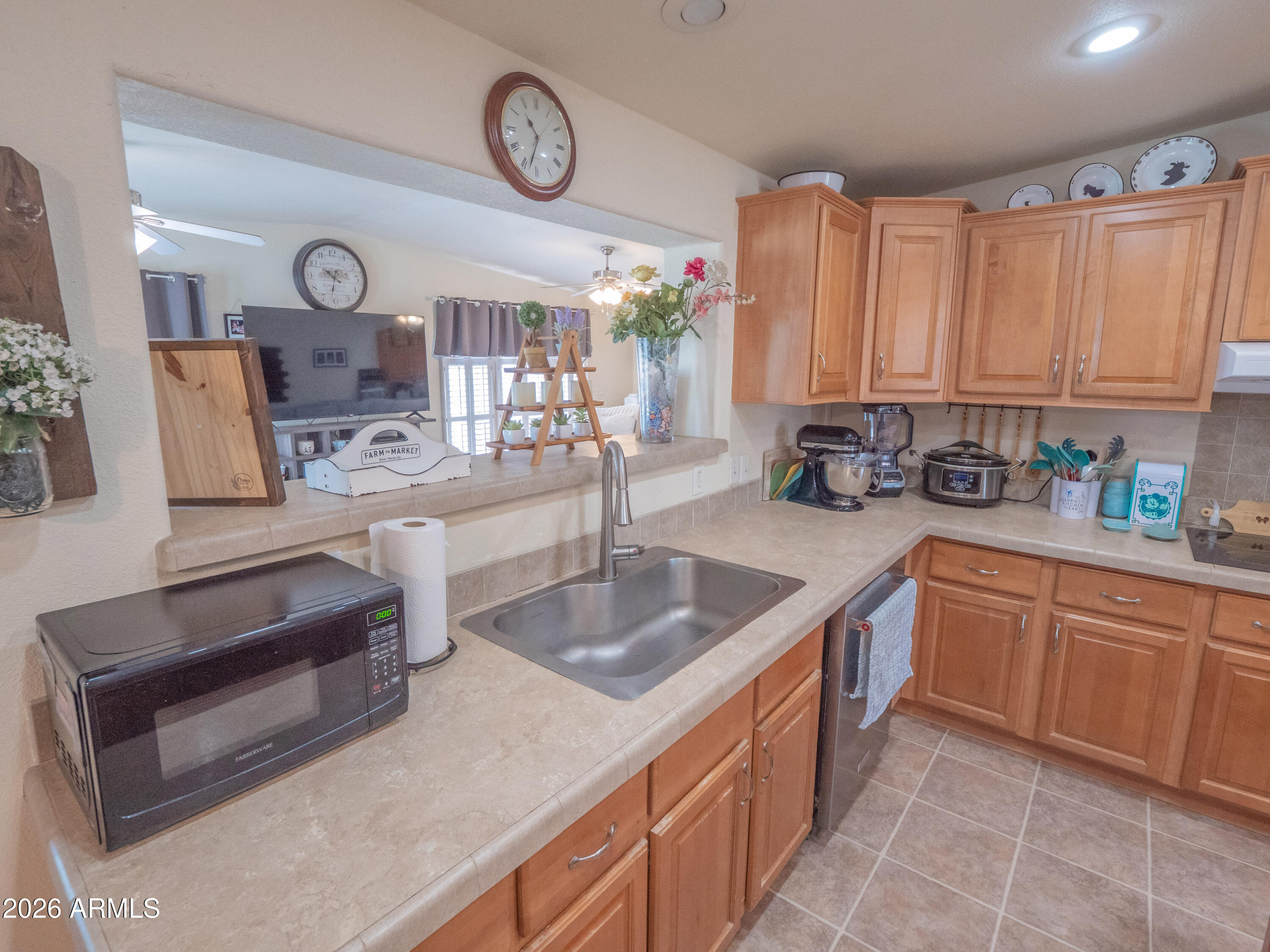 1401 Ranch Road Taylor, AZ 85939 - Photo 16 of 61 a kitchen with stainless steel appliances granite countertop a sink and cabinets