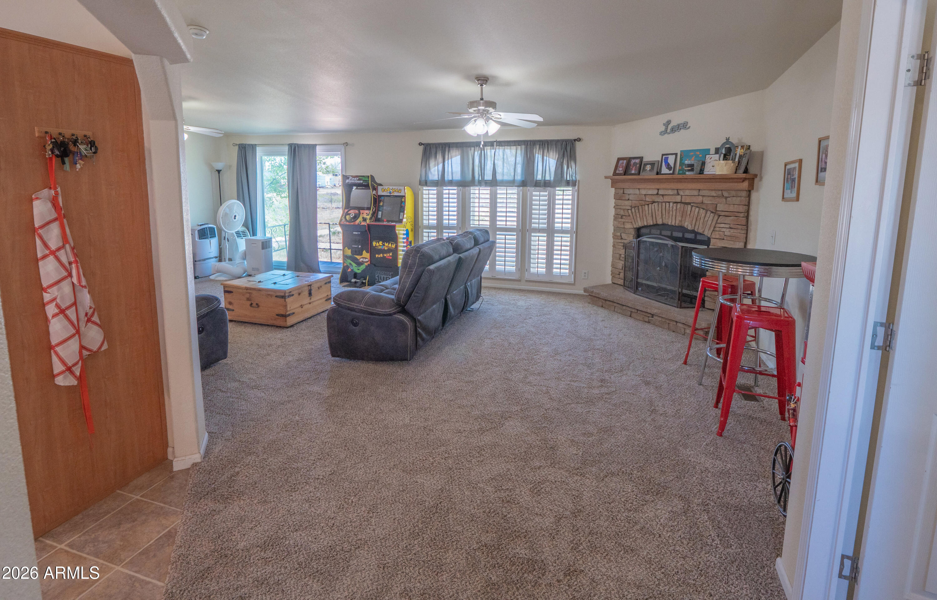 1401 Ranch Road Taylor, AZ 85939 - Photo 24 of 61 a living room with furniture and a fireplace