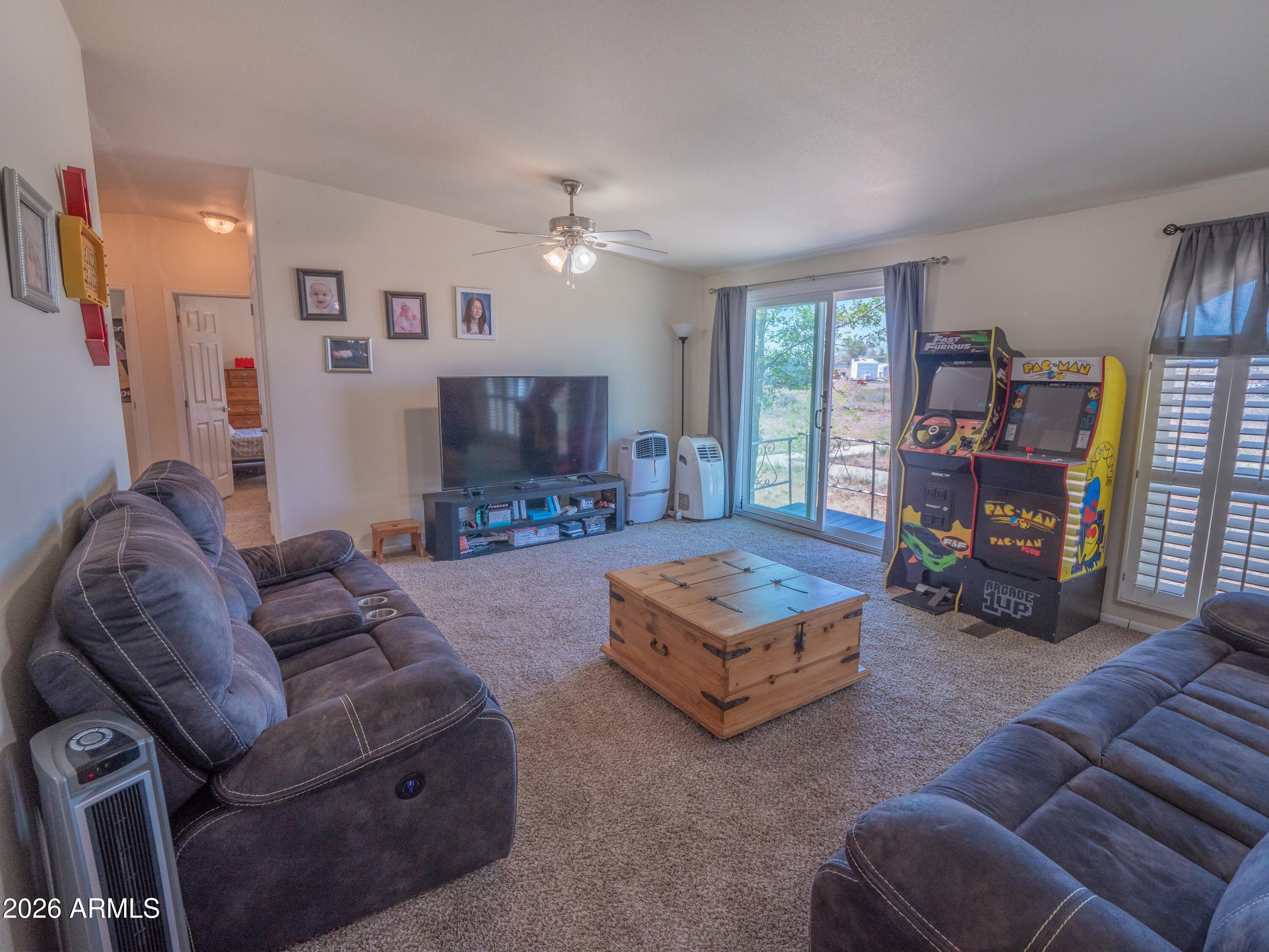 1401 Ranch Road Taylor, AZ 85939 - Photo 27 of 61 a living room with furniture and a flat screen tv
